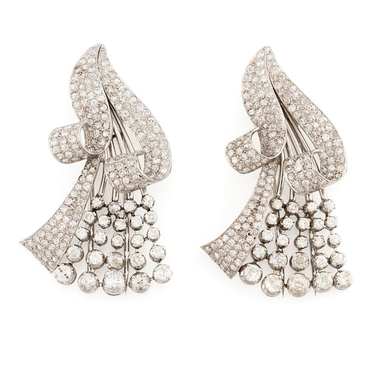 A pair of platinum brooches with old-cut, round brilliant-cut and single-cut diamonds.