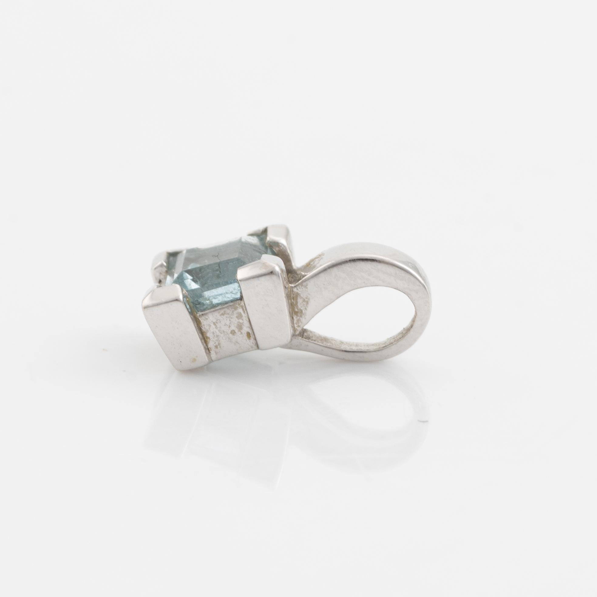 Ring, pendant, and a pair of earrings, 18K white gold with topaz and small diamonds.