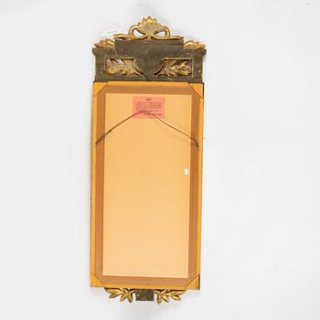 A Gustavian style mirror, mid 20th century.