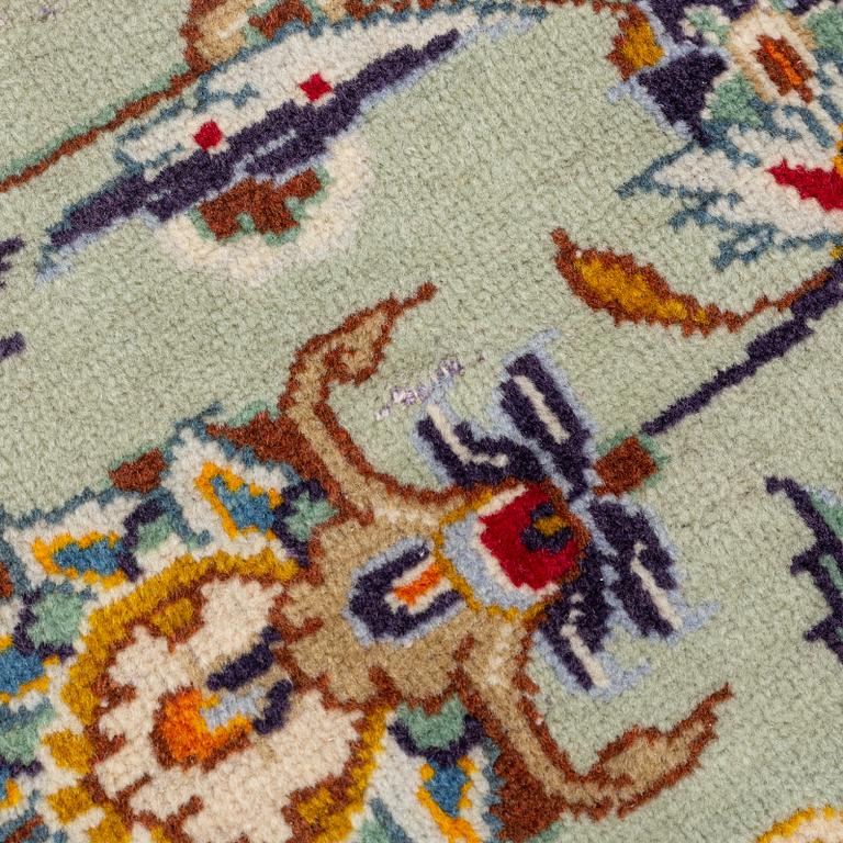 A Keshan carpet, signed, c. 410 x 297 cm.