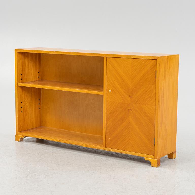 An earlier 20th century book case.