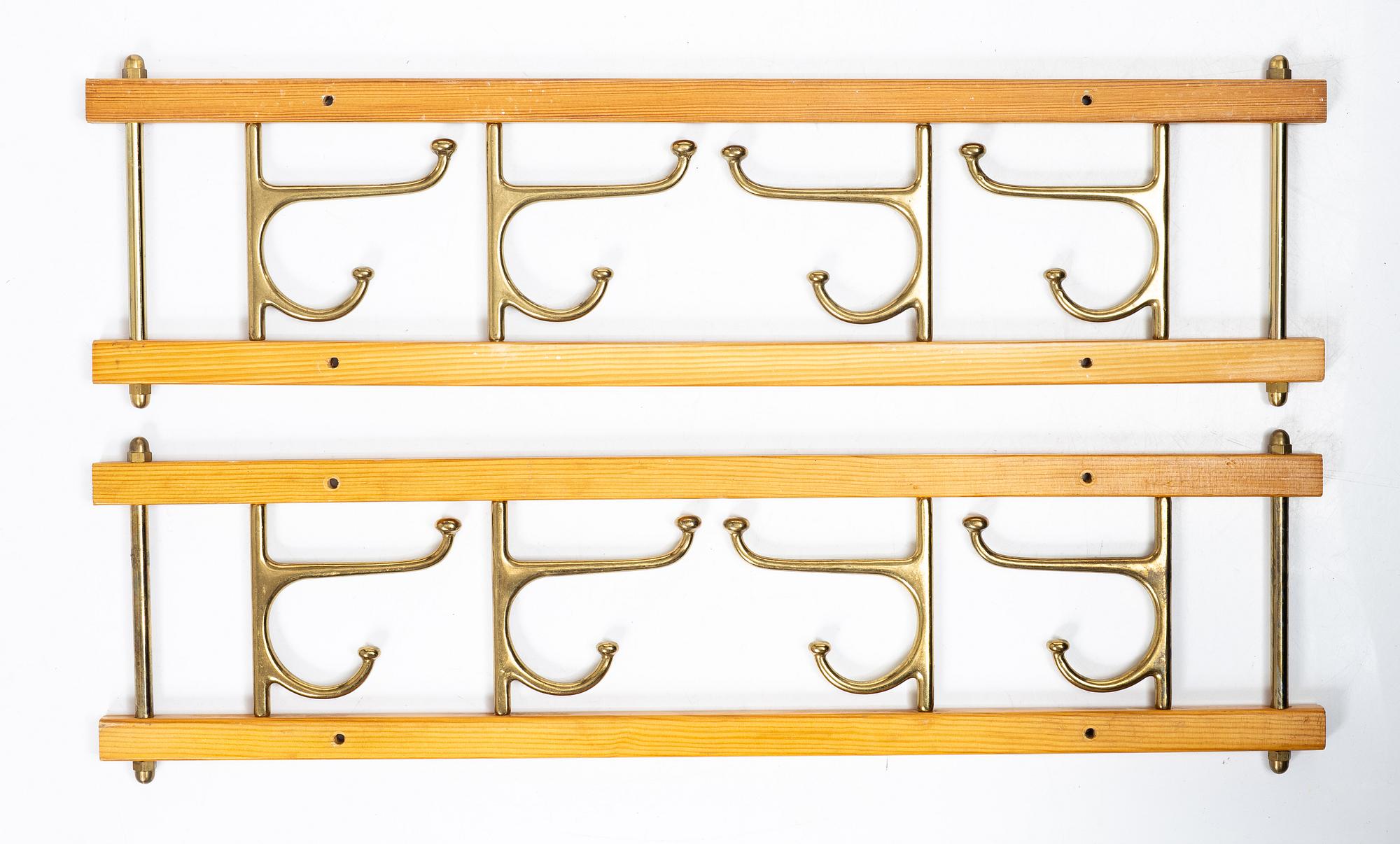 Klädhängare, ett par, "Dekorativ", Skoglunds metallgjuteri, Anderstorp, 1950/60-tal.