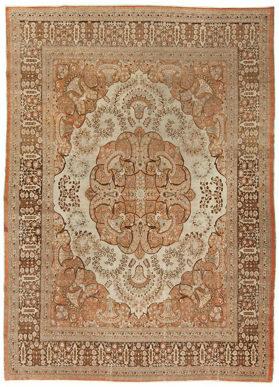 A CARPET. An antique Tabriz. 426 x 311 cm.