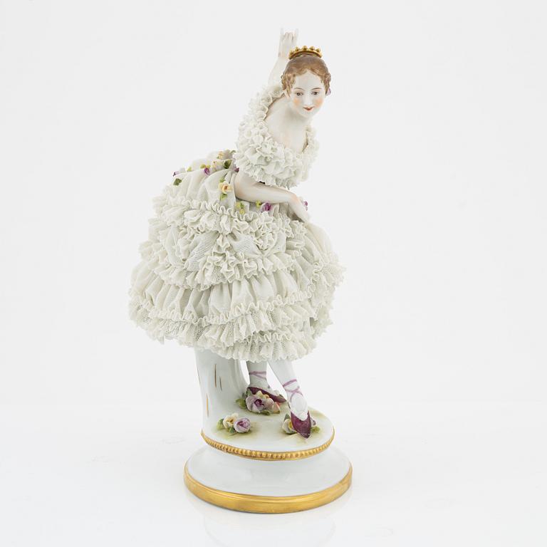 A porcelain figurine, Rudolstadt Volkstedt, Germany, mid 20th Century.