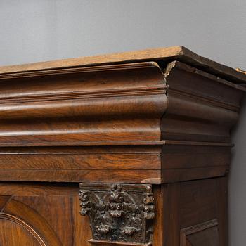 A walnut veneered Baroque cabinet, from around the year 1700.