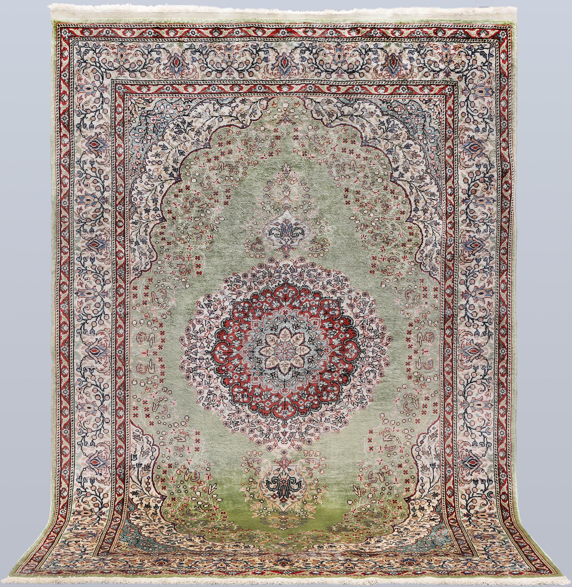 A semi-antique silk Kaysari rug, Turkey, 152 x 103 cm.