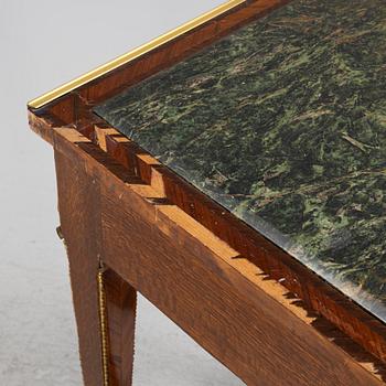 A Louis XVI-style gilt-brass mounted console table, circa 1900.