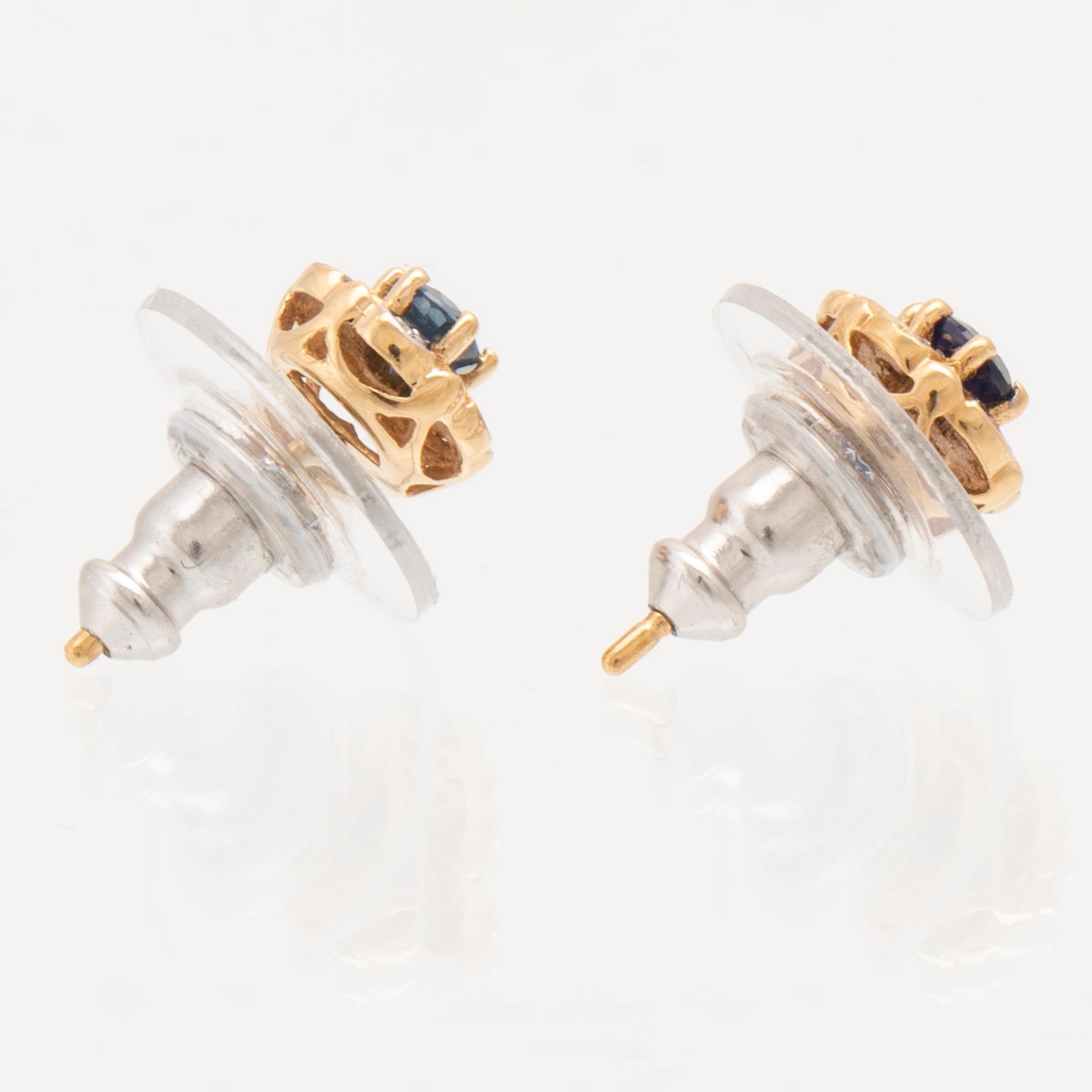 Ring, earrings, and pendant, 18K gold with sapphires and diamonds.