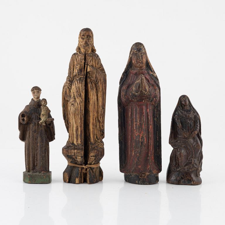 Four wooden sculptures, 18th century or older.