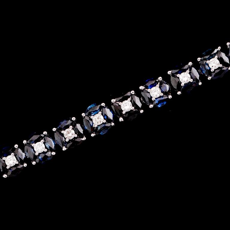 ARMBAND, 18 k vitguld, briljantslipade diamanter tot ca 1.21 ct, navettslipade safirer tot ca 11.16 ct.