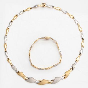 A 14K gold necklace and bracelet.