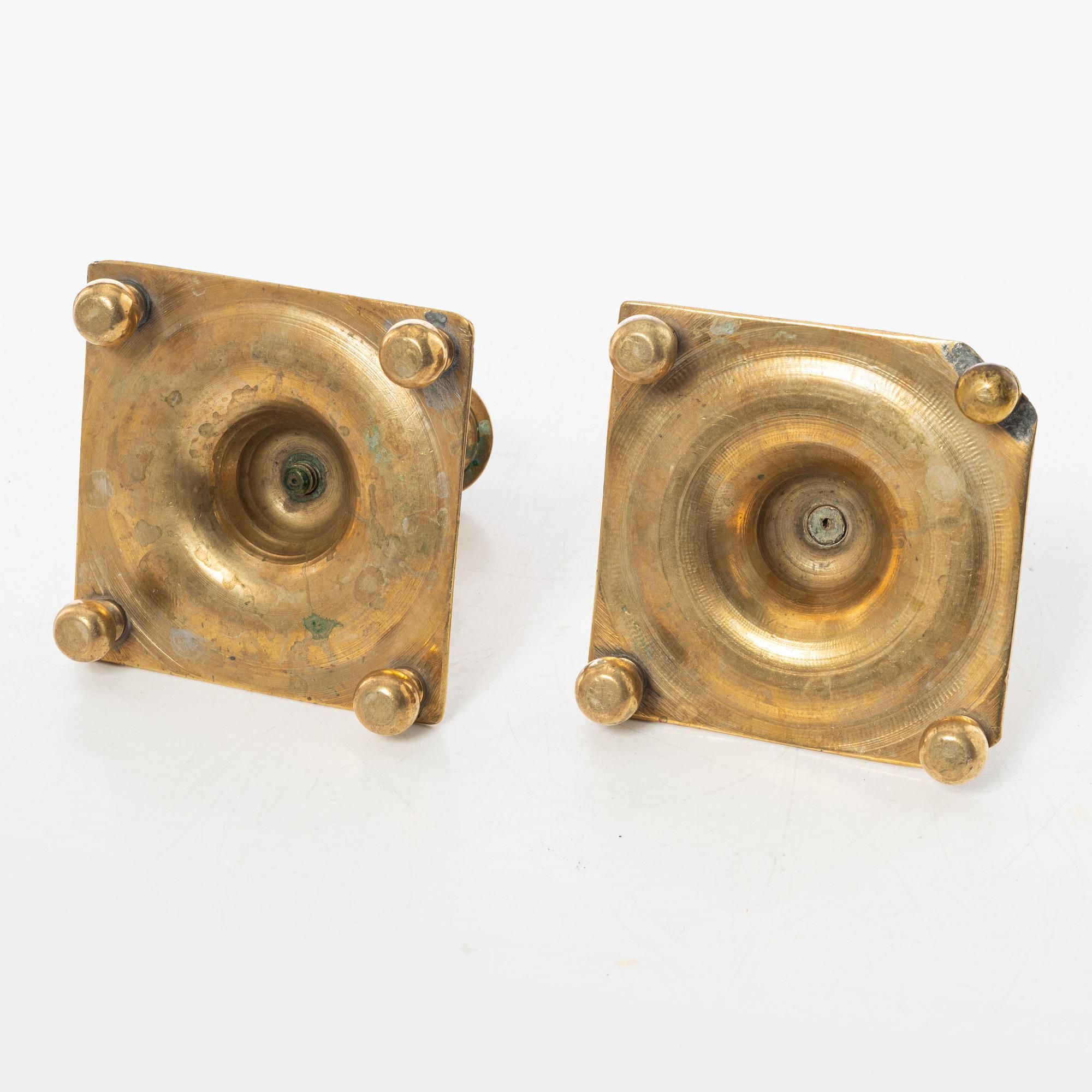 A pair of North European baroque brass candlesticks, circa 1700.