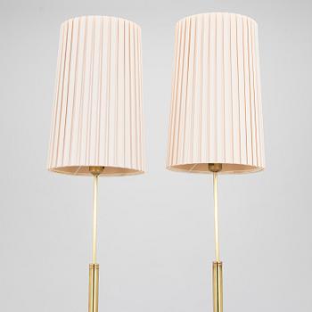 A pair of late 20th century floor lamps.