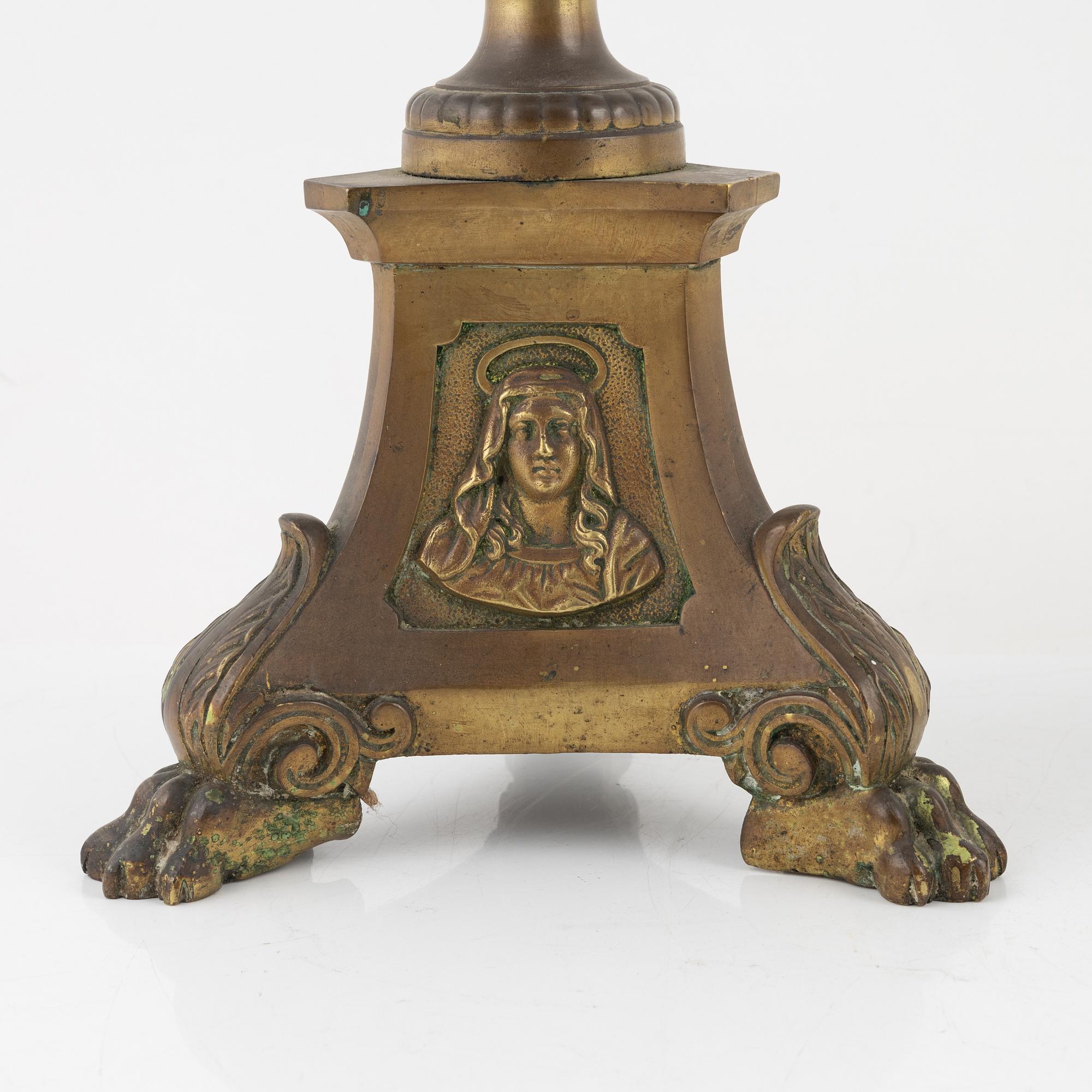 A pair of Baroque style brass altar candleholders, circa 1900.