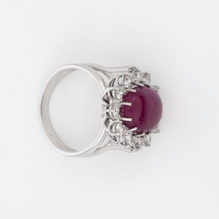 A 10.00 ct untreated cabochon-cut ruby and brilliant-cut diamond ring. Total carat weight of diamonds 0.70 ct. GRS cert.