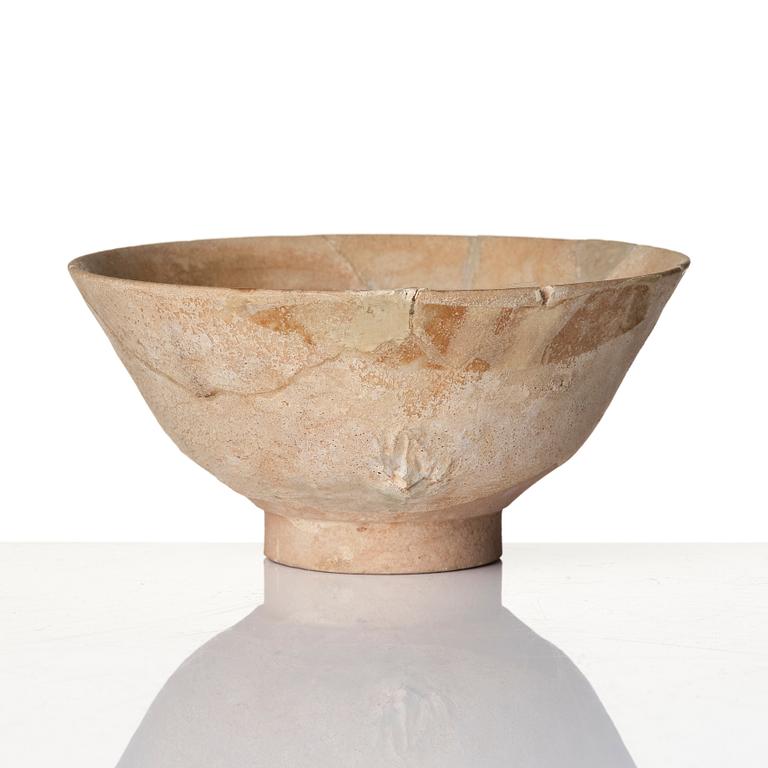 A Persian pottery bowl  13th century.