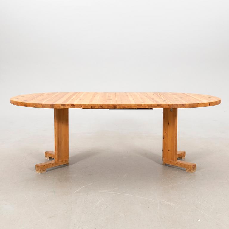 A pine dining table, 1970s.