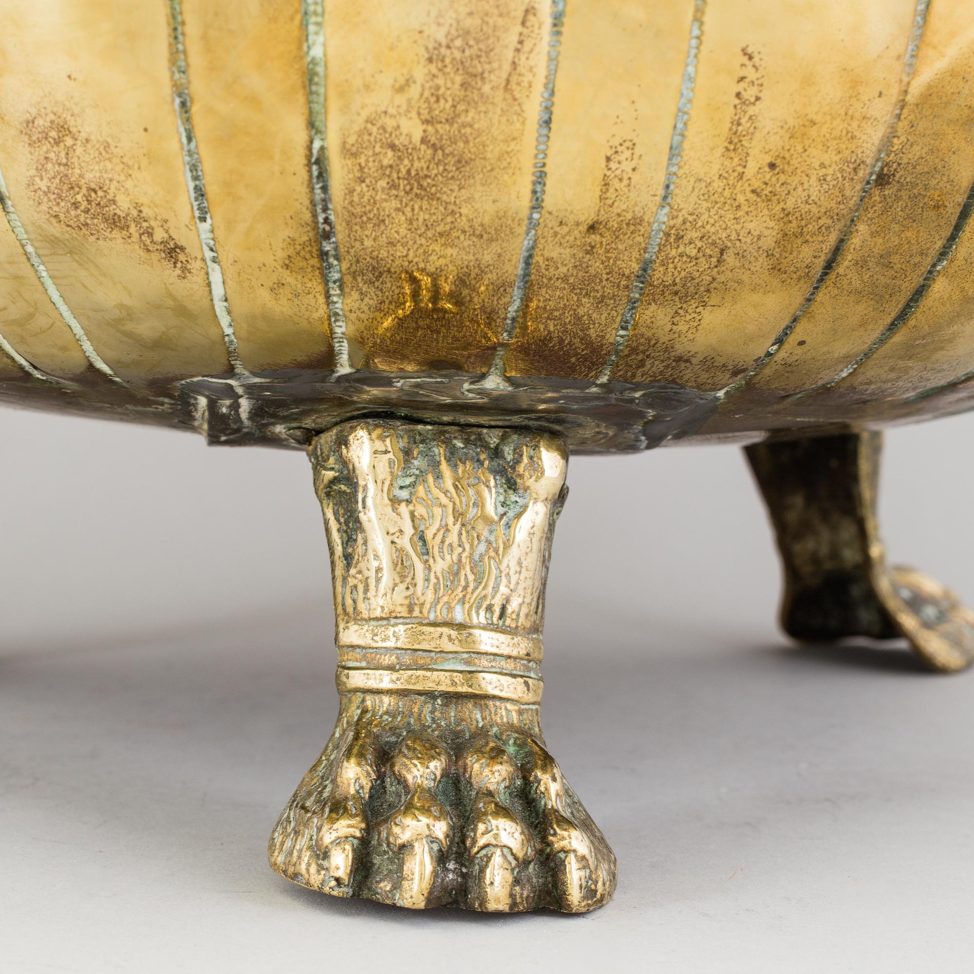 A 19th century brass flower pot.