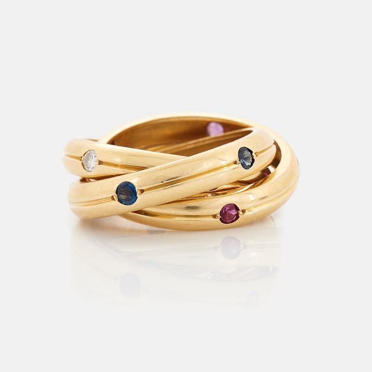 Cartier ring "Trinity" 18K guld med runda briljantslipade diamanter, rubiner och safirer.