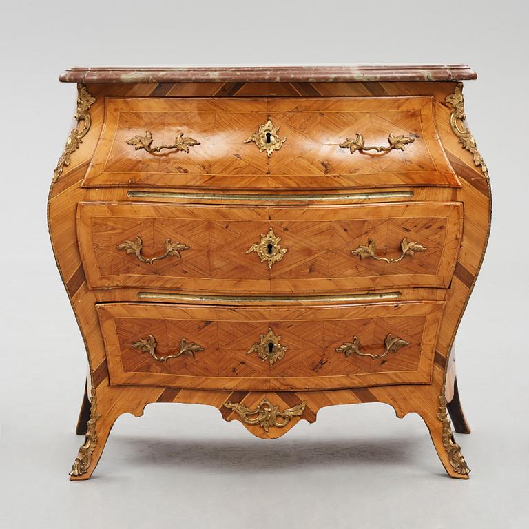 A parquetry and ormolu-mounted rococo commode by P. Gyllenberg (master in Stockholm 1767-85).