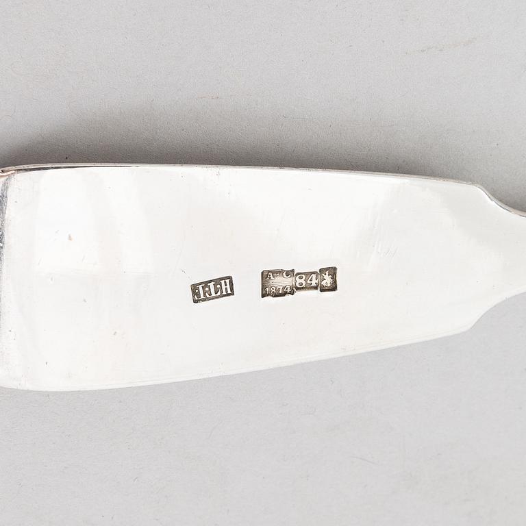 A Russian silver soup ladle and two pairs of silver spoons, Moscow 1874 and Saint Petersburg 1868 and 1887.