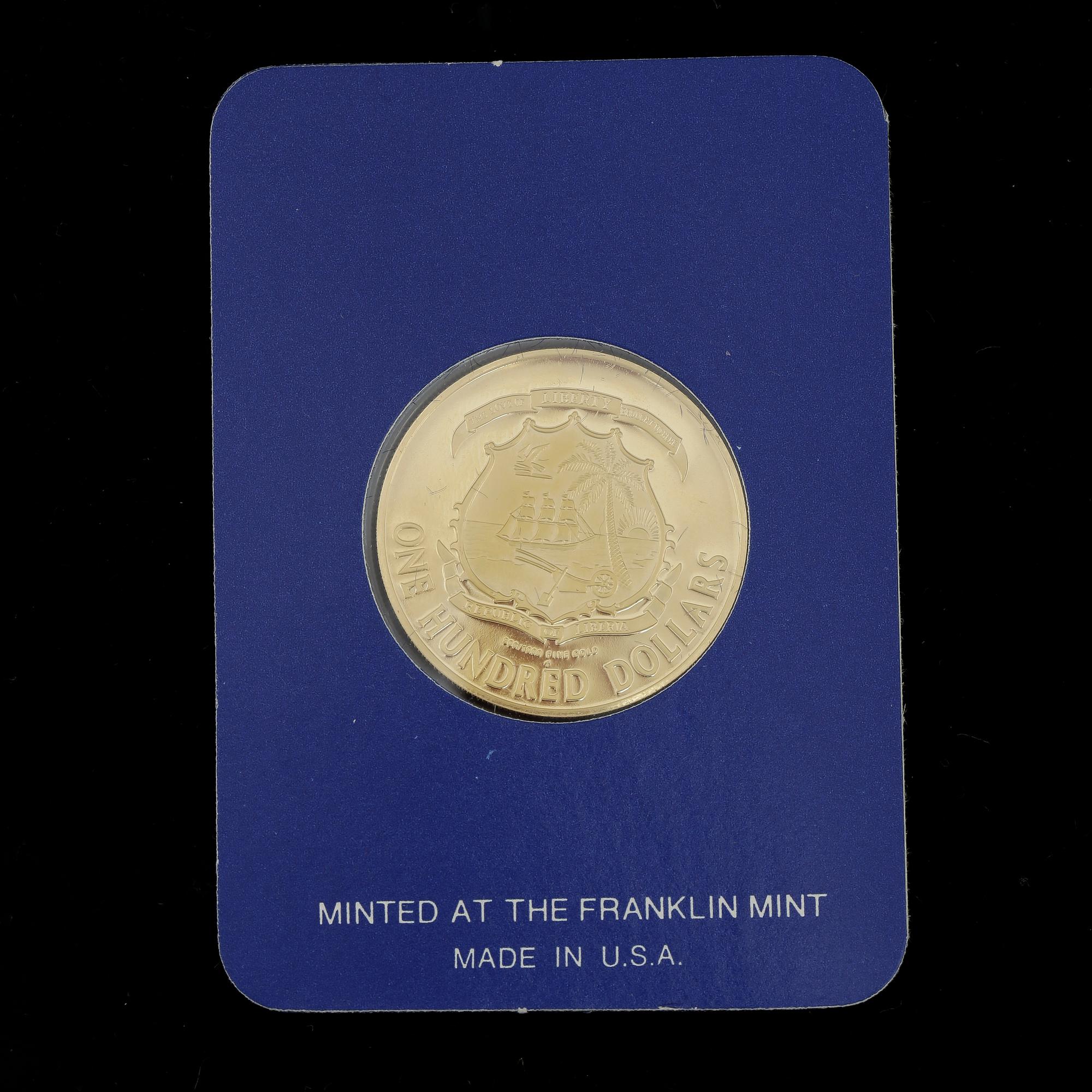 MINNESMYNT, 21,6 K guld, 100 dollar, Liberia, 1977. Vikt ca 10,9g.