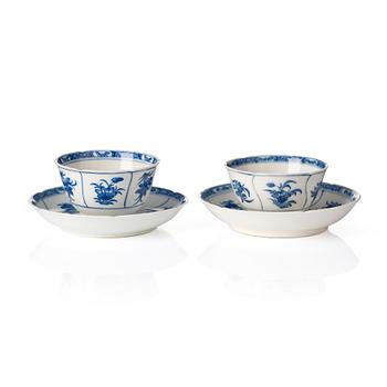 1162. A pair of blue and white 'soft paste' cups with saucers, Qing dynasty, Kangxi (1662-1722).