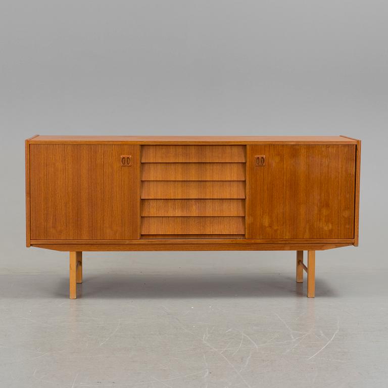 A 1960´s sideboard venereed in teak.