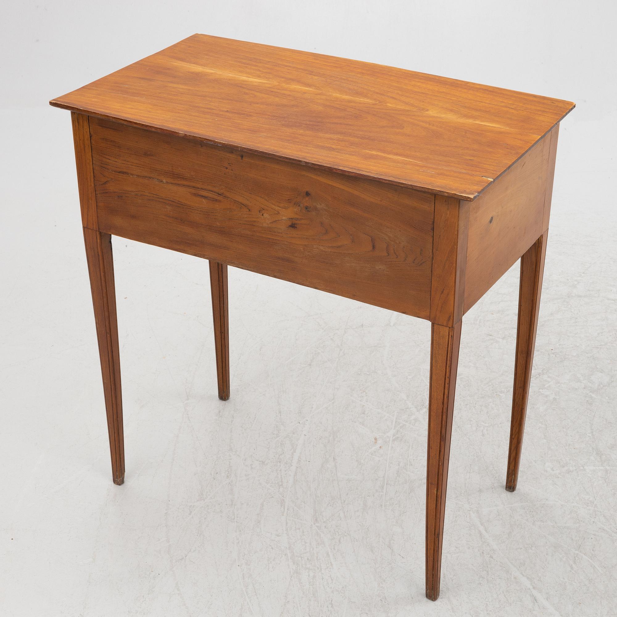 A side table with drawers, first half of the 19th century.