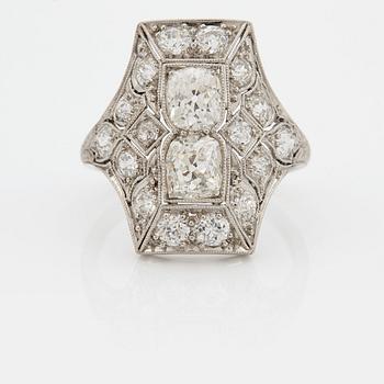 A RING set with old-cut diamonds.