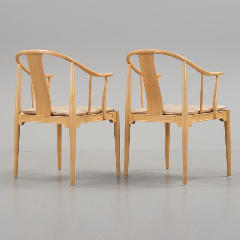 A pair of Hans J Wegner 'China' chairs, Fritz Hansen, Denmark 1987.