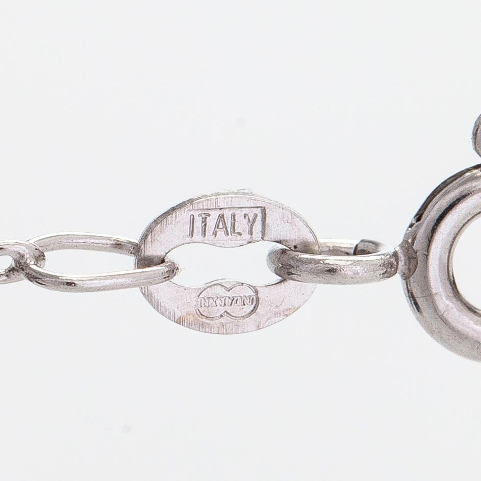 Halsband, 14K vitguld, hänge i form av hjärta med diamanter totalt ca 0.50 ct.