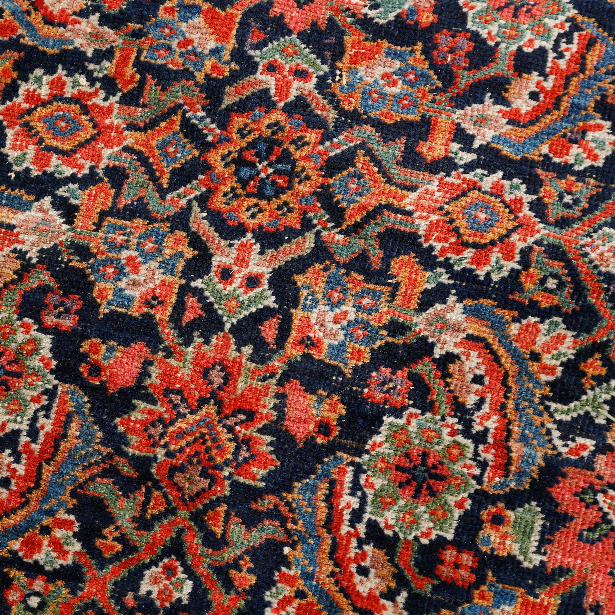 A Farahan rug, semi-antique/antique, 390 x 197 cm.