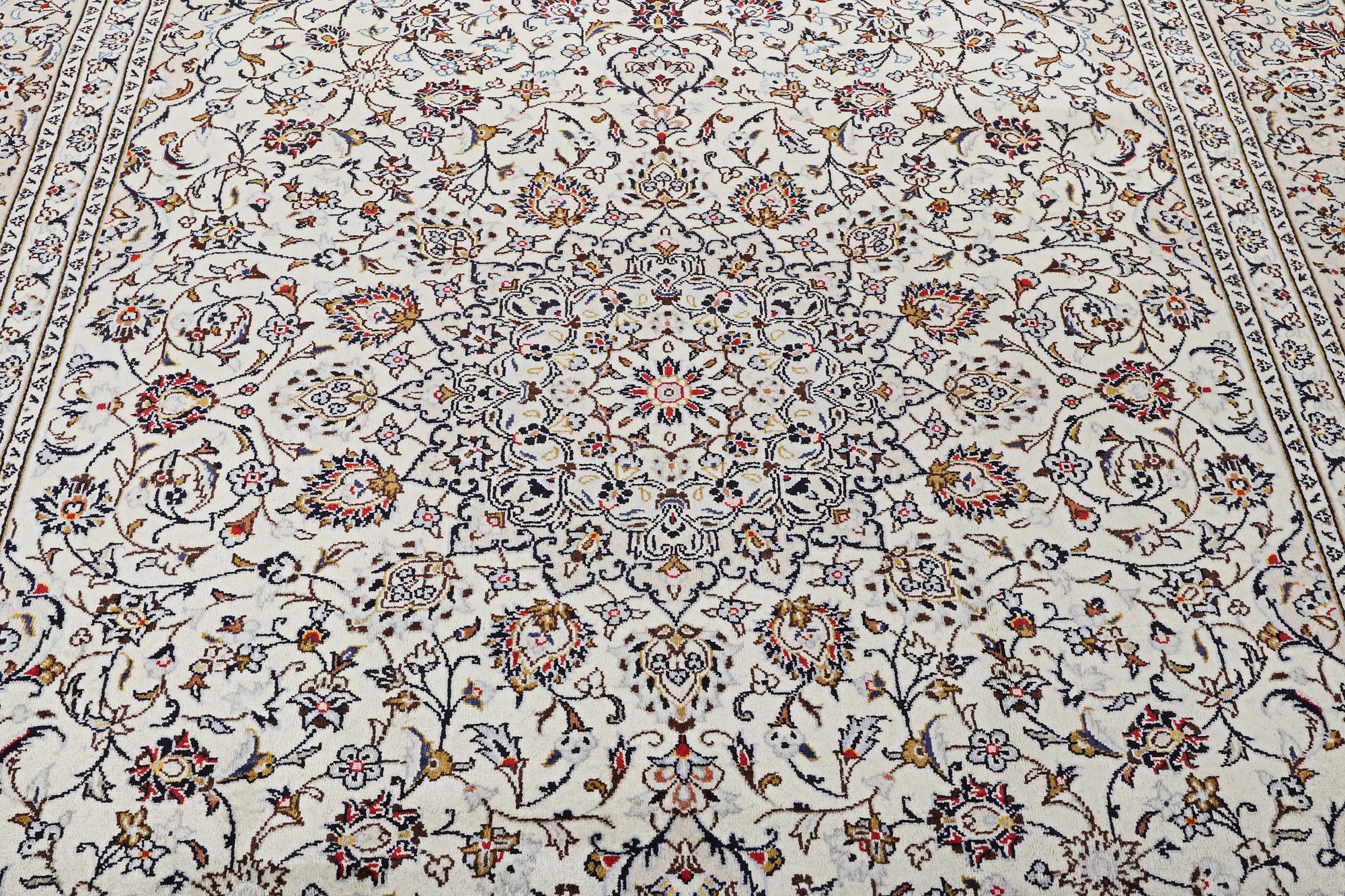 A Kashan carpet, c.355 x 243cm.