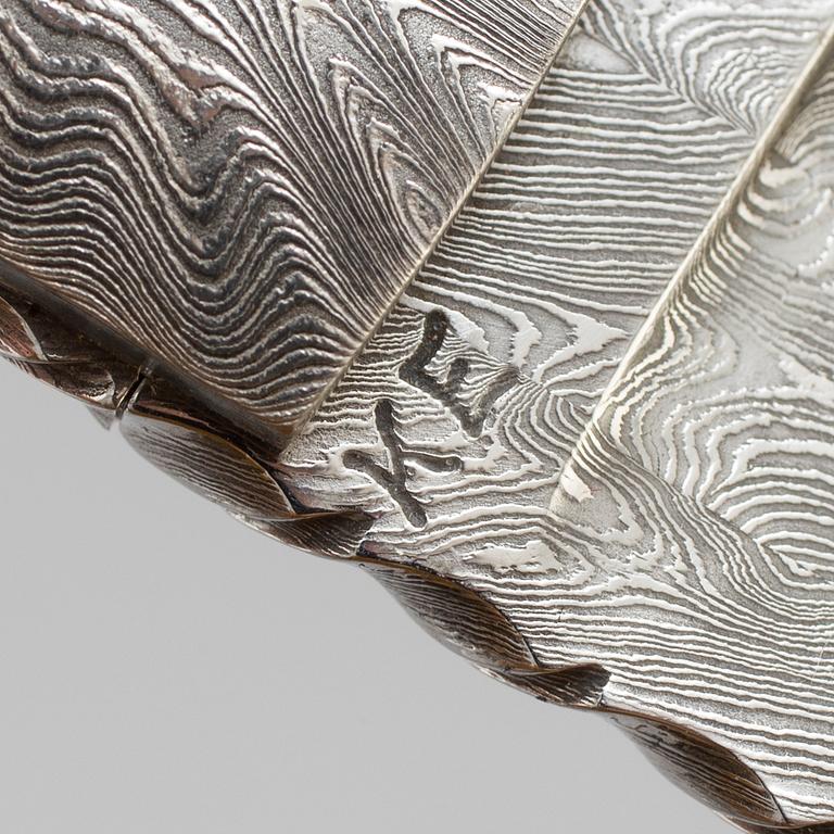 Kaj Embretsen, a damascus steel folding knife, signed.
