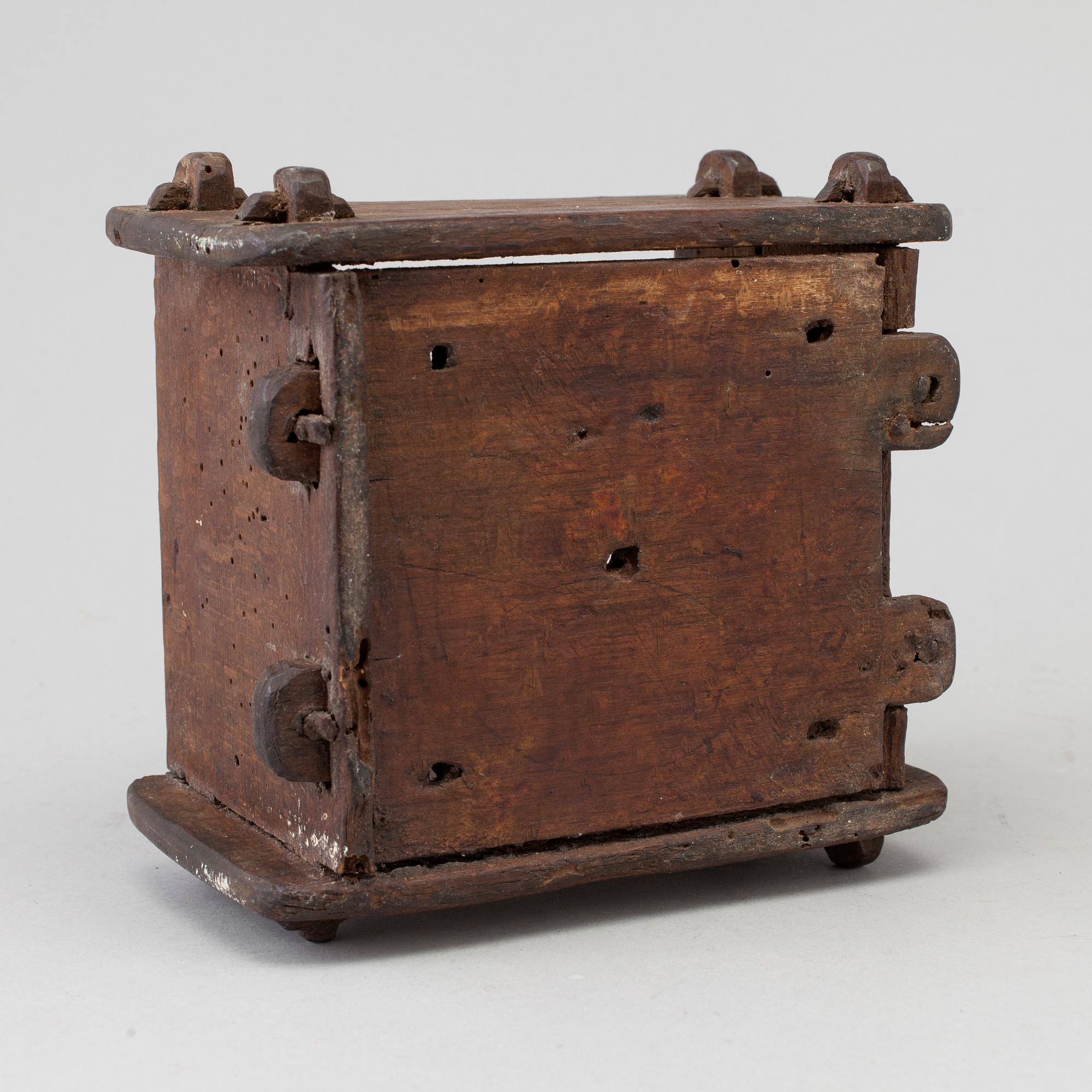 A cheese mould, dated 1768.