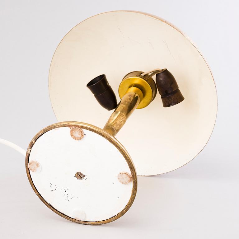 A mid-20th century table lamp for Itsu, Finland.