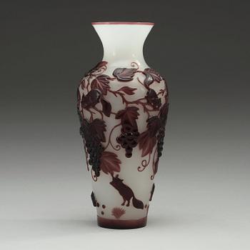 A Chinese purple overlay peking glass vase, 20th Century.