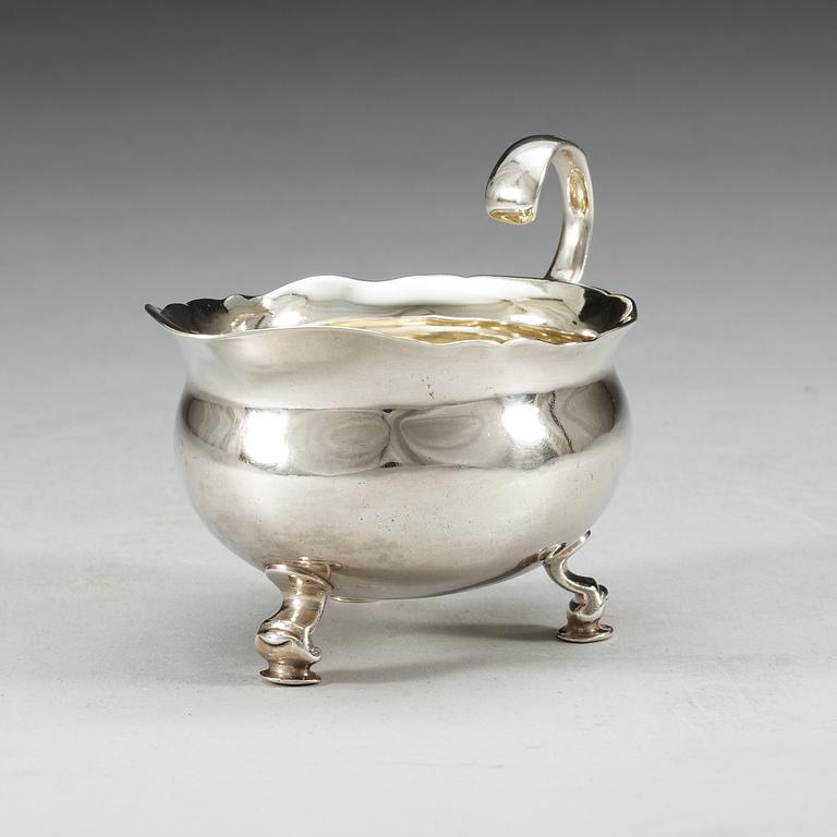 A Swedish 18th century parcel-gilt cream-jug, makers mark of Henrik Wittkopf d.ä., Stockholm 1747.