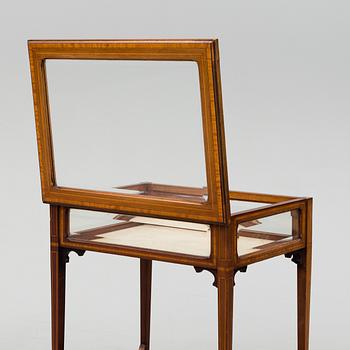 An early 20th century display table.