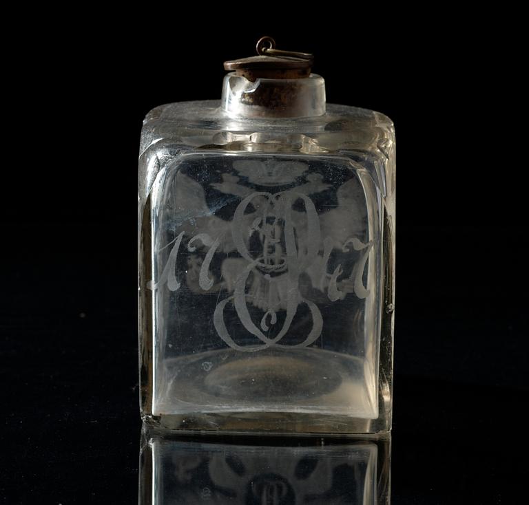 A Russian glass tea caddy, dated 1747.