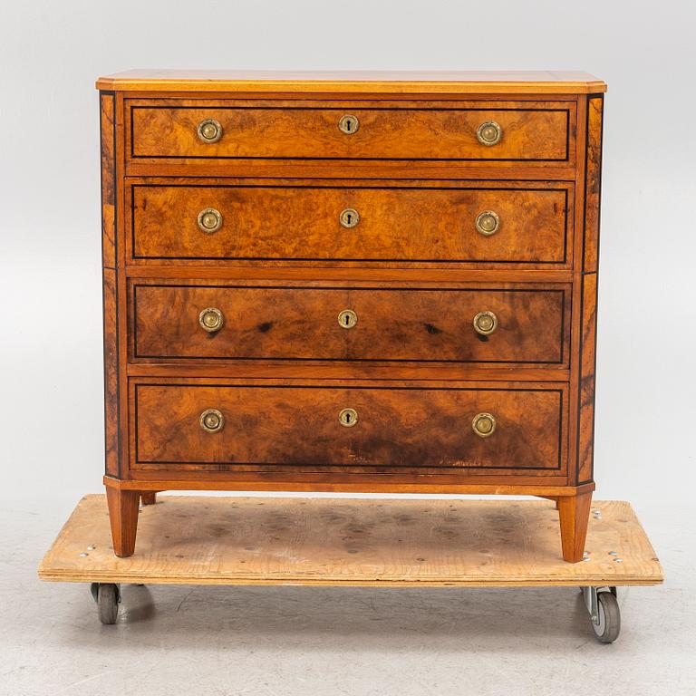 A chest of drawers, circa 1900.