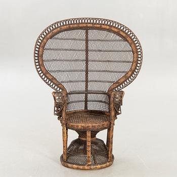 A rattan chair later part of the 20th century.