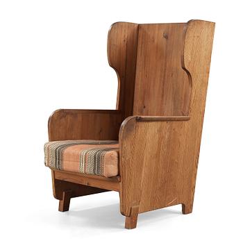 An Axel Einar Hjorth 'Lovö' stained pine armchair, Nordiska Kompaniet, Sweden 1930's.