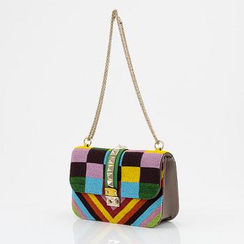 Valentino, a multicolor pearl embroidered rock stud bag.