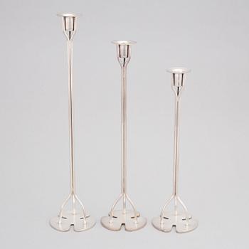 Josef Frank, a set of three silvered brass 'Klöver' candlesticks for Firma Svenskt Tenn, the model designed 1952.