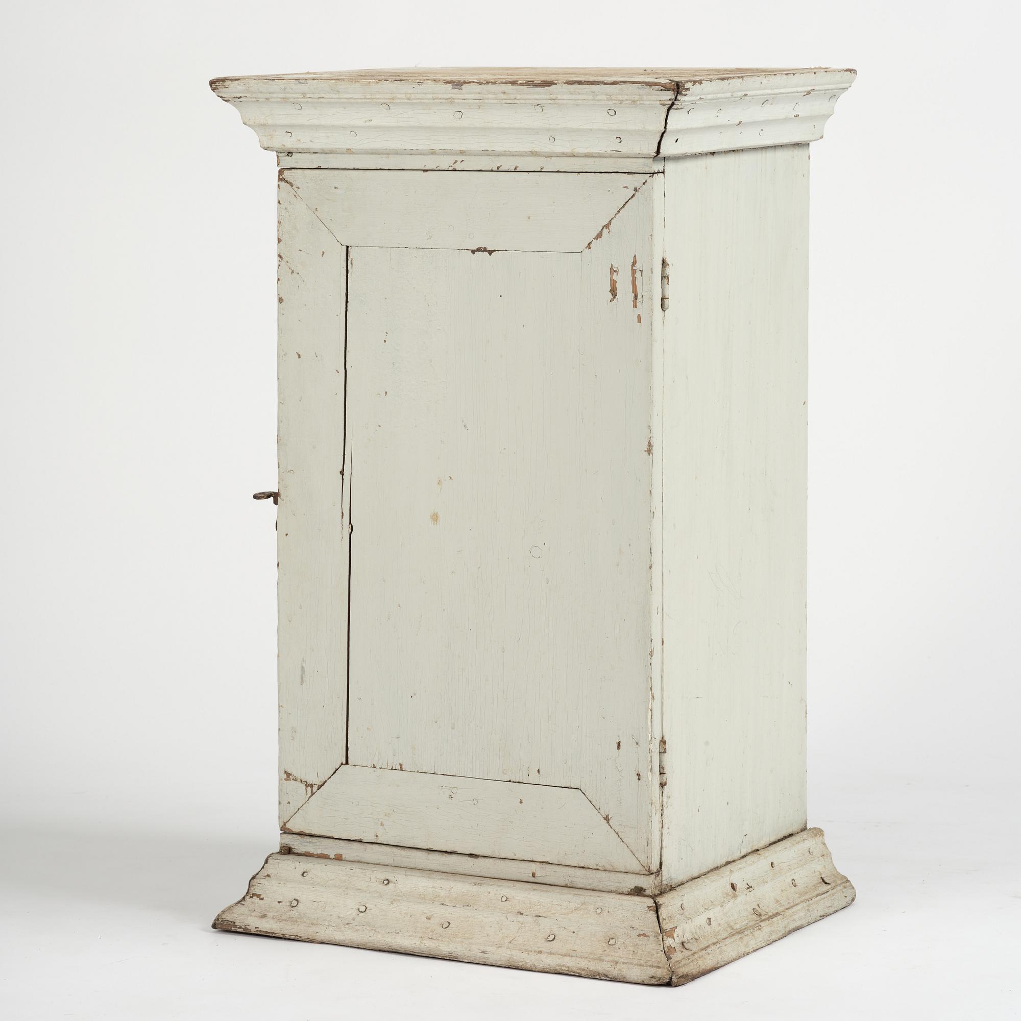 A Gustavian column-shaped cabinet, circa 1800.
