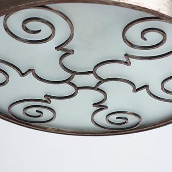 Lars Holmström, a Swedish Grace brass and steel framed ceiling light, Arvika 1920-30s.