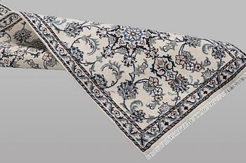A runner carpet, Nain, part silk, ca 289 x 79 cm.
