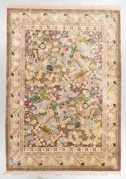 A carpet, Old silk China, ca 242 x 170 cm.